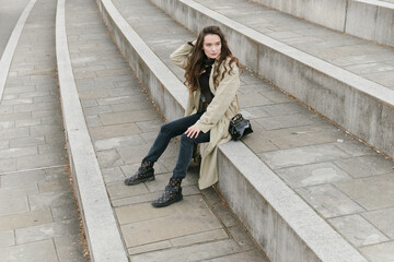 Young beatiful woman portrait in the historical city centre of Ljubljana in trendy outfit