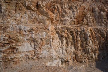 Brown marble quarries. Italian marble quarries. Quarry section. Quarry wall in the mountains. marble quarries.