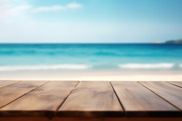 Fototapeta na wymiar Empty Wooden table in tropical beach of summer time blurred background.