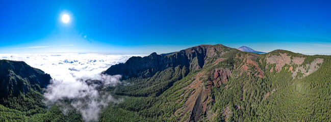 Fototapeta na wymiar Aerial sunrise view above the clouds on Tenerife - Corona Forestal