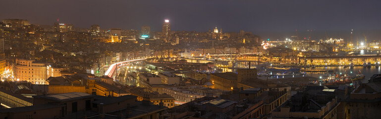 The panorama of Genova at dusk.