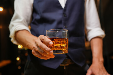 Bartender pouring Whiskey, on  bar,