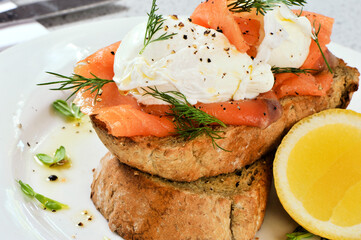 smoked salmon and poach eggs on sourdough toast