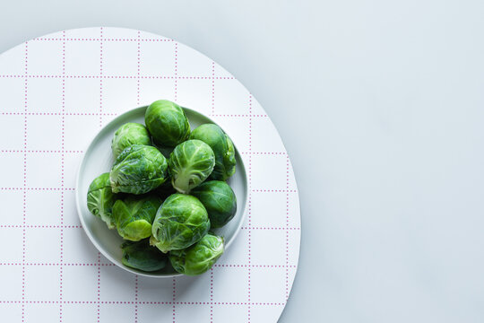 brussels sprouts in a white dish with copyspace