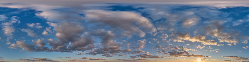 sunset sky with evening clouds as seamless hdri 360 panorama view with zenith in spherical...