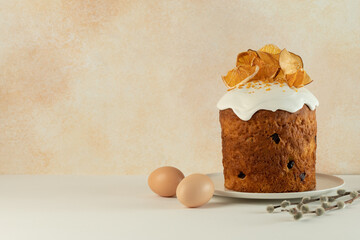 Delicious Easter cake with eggs and pussy willow branches on grunge background with space for text