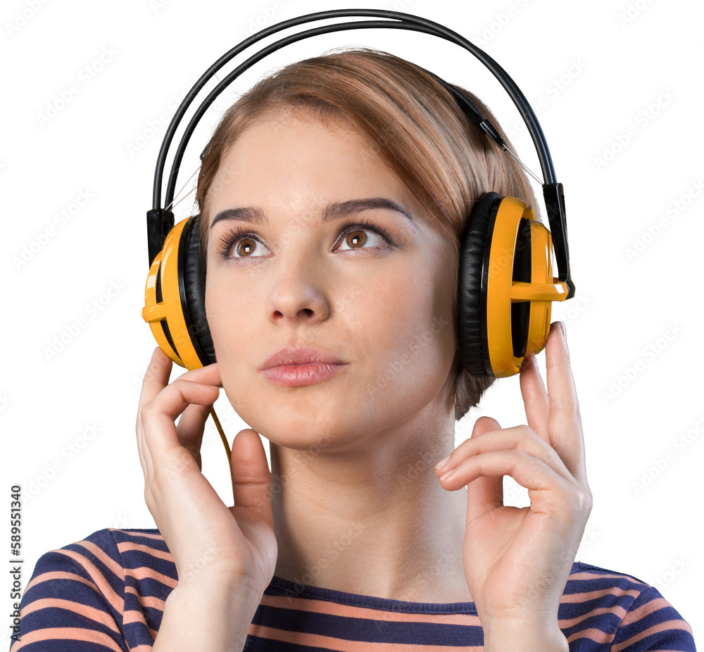 Sticker Pretty girl wearing headphones while listening music isolated on white