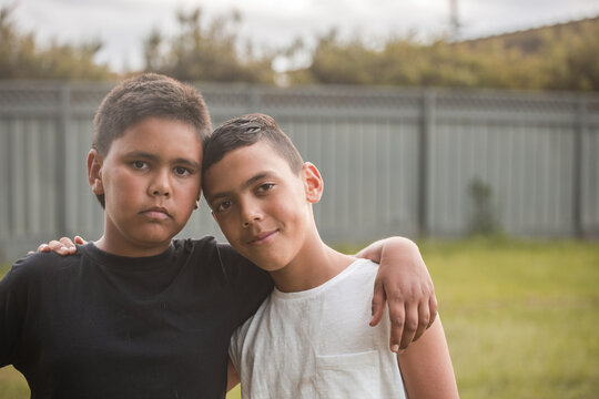 Two aboriginal boys looking at the camera