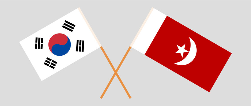 Crossed flags of South Korea and The Emirate of Umm Al Quwain. Official colors. Correct proportion