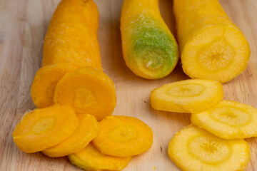 Pieces of sliced peeled carrots are yellow