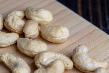 Hard roasted and peeled cashew nuts on the table