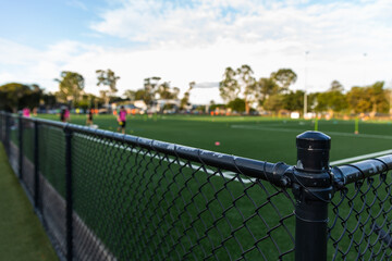 afternoon football practice in the suburbs