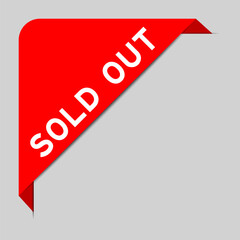 Red color of corner label banner with word sold out on gray background