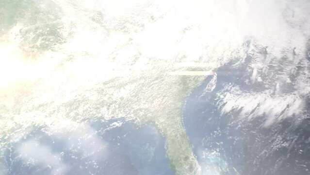 Earth zoom in from outer space to city. Zooming on Warner Robins, Georgia, USA. The animation continues by zoom out through clouds and atmosphere into space. Images from NASA
