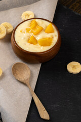 natural yogurt with pieces of fruit and banana flavor