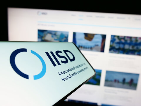 Stuttgart, Germany - 04-01-2023: Cellphone With Logo Of Think Tank IISD Institute On Screen In Front Of Website. Focus On Center Of Phone Display.