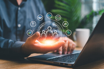 Customer network relationship management concept, Businessmen use laptops and hold global network technology ,human management development and data social media digital marketing online.