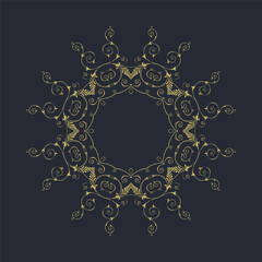A gold floral pattern on a dark background