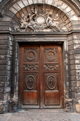 Fototapeta na wymiar Big old wood door in Le Marais, Paris, France
