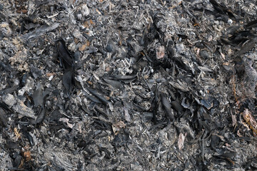 gray and black ashes from leaves and wood for pattern and background.