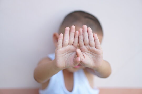 Boys Raise Their Hands To Prevent Violence Against Children.