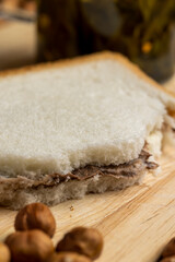 slices of bread with chocolate butter on the table