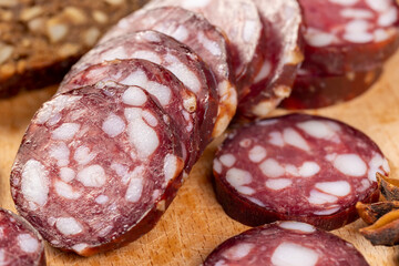sliced high-quality pork sausage with the addition of lard pieces