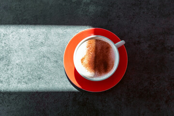 coffee cup over dark table / top view / Kaffee / Coffee / Kaffeezeit / Tasse / Warm / heiß /Espresso / Mokka / Cappuccino / Bohnenkaffe / Milch / Zucker / kaffeesatz - obrazy, fototapety, plakaty