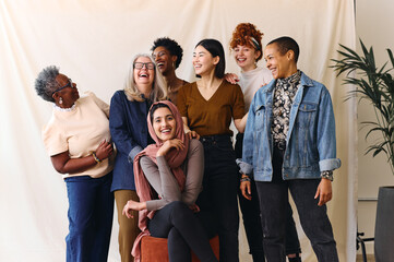 Portrait of cheerful mixed age range multi ethnic women celebrating International Women's Day - Powered by Adobe