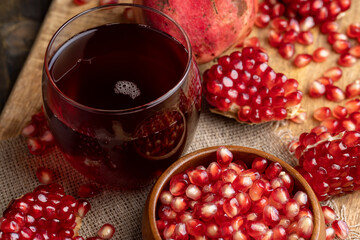 Sweet and sour pomegranate juice in a transparent glass