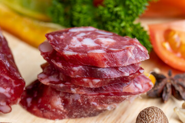 sliced sausage from pieces of meat with bacon