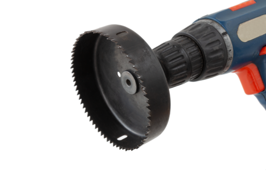 hole saw with attachment on an electric screwdriver, for drilling round holes in furniture or drywall, isolated, cut out - Powered by Adobe