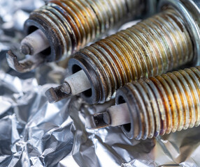 old very damaged car spark plugs