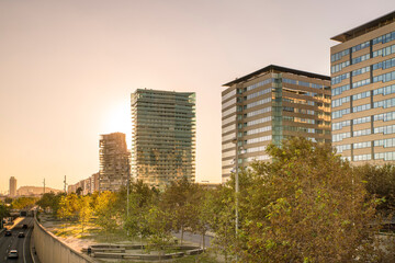 Modern residential  and business buildings at Sant Marti by Passeig de Garcia Faria before sunset