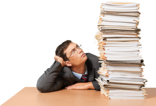 Tired young businessman with stack of papers