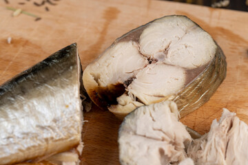 Fototapeta na wymiar Smoked Atlantic mackerel cut into pieces