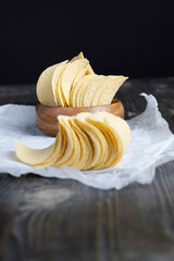 thin potato chips with spices, close up