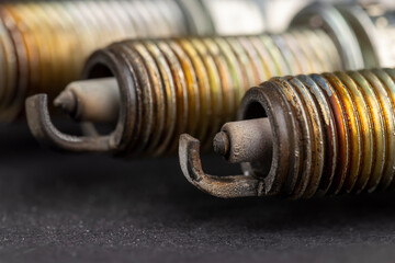 old very damaged car spark plugs