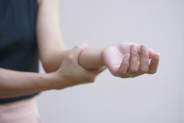 Asian women have muscle weakness and numbness in their arms.