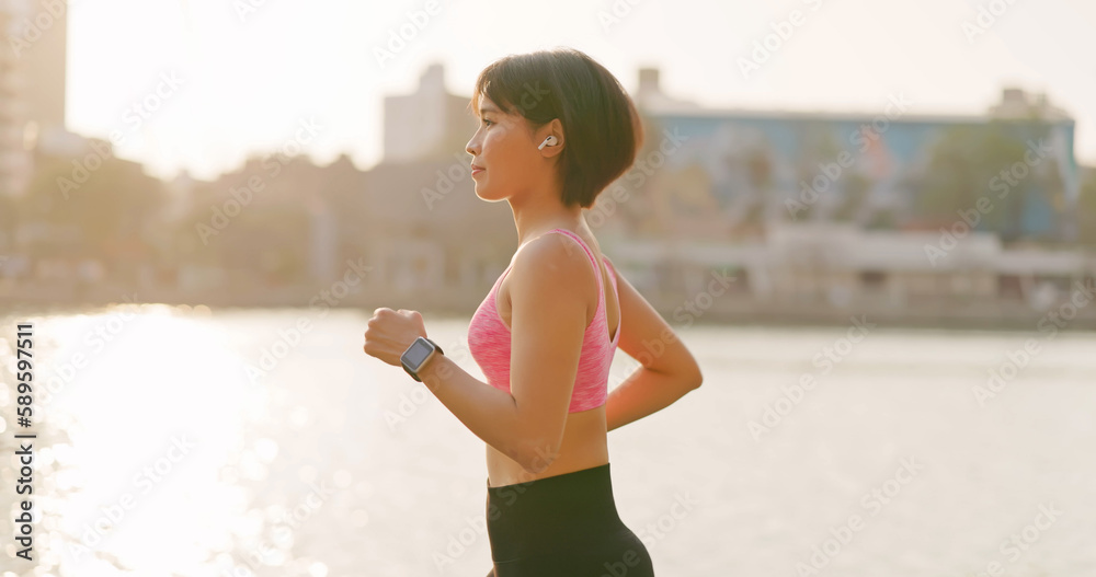 Poster asian female jogging in city