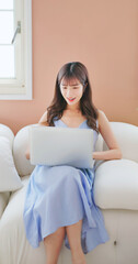 asian girl watch notebook happily