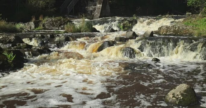 Landscape view of Myllykoski rapids and wooden bridges in autumn, Nurmij&auml;rvi, Finland.