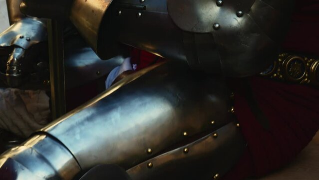 close-up detail of a medieval knight wearing armor from the medieval era