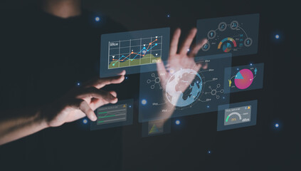 Young entrepreneur using big data analysis and cloud technology to collect customer data and display on application dashboard from digital tablet to understand sale forecast and marketing plan.