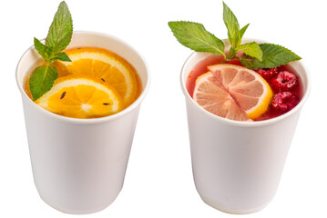 Yellow sea buckthorn and citrus tea red raspberry and lemon tea garnished with mint leaves