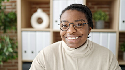 Naklejka premium African american woman business worker smiling confident at office