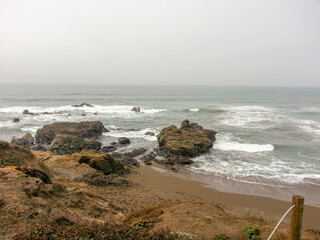 waves crashing on rocks