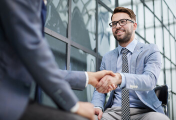 Business people shaking hands, finishing up meeting