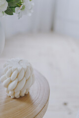 A wicker candle in an interior