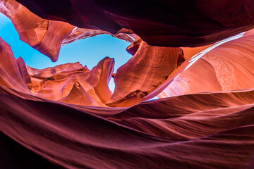 Low angle view of rock formations. Antelope Canyon in the Navajo Reservation Page Northern Arizona. Famous slot canyon. Light showing off the glamorous detail of the ancient spiral rock arches.